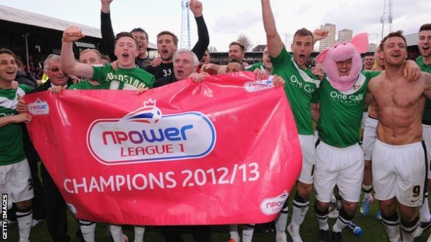 Doncaster Rovers celebrate becoming League One champions after James Coppinger's 96th minute winner