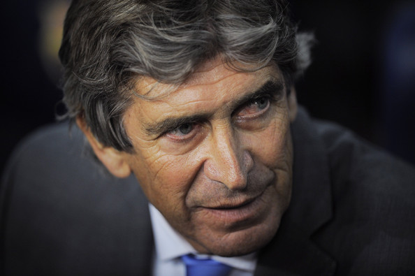 Malaga head coach Manuel Pellegrini is the clear favourite to replace Roberto Mancini at Manchester City